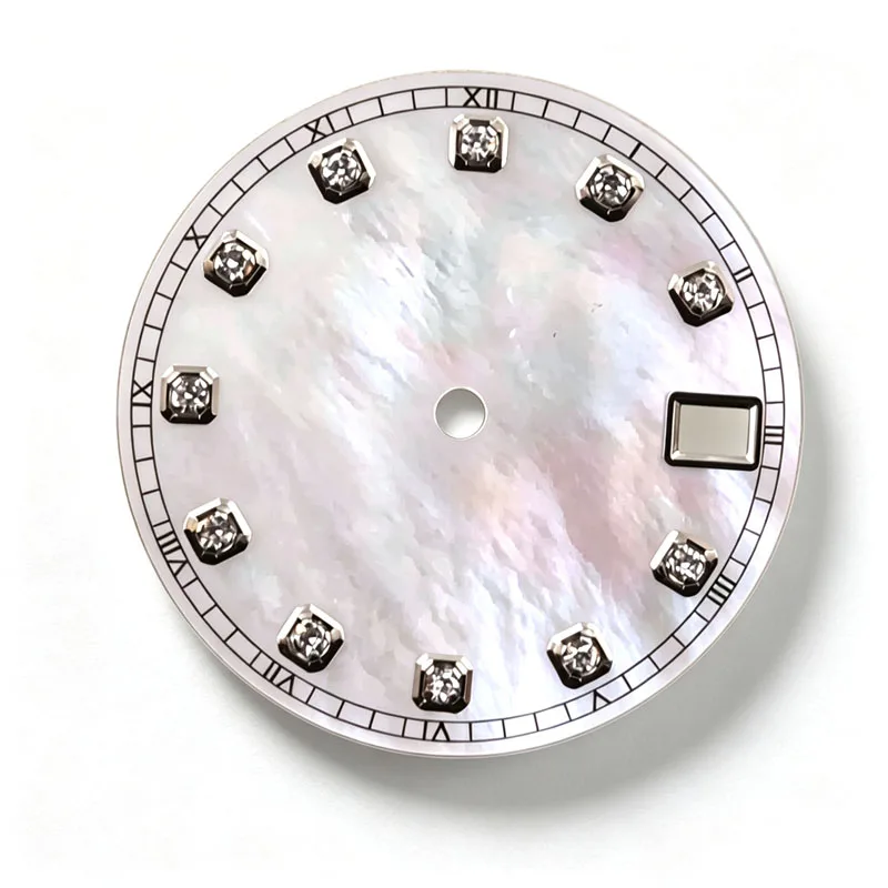 Custom Mother-of-Pearl dial is applied as a thin l