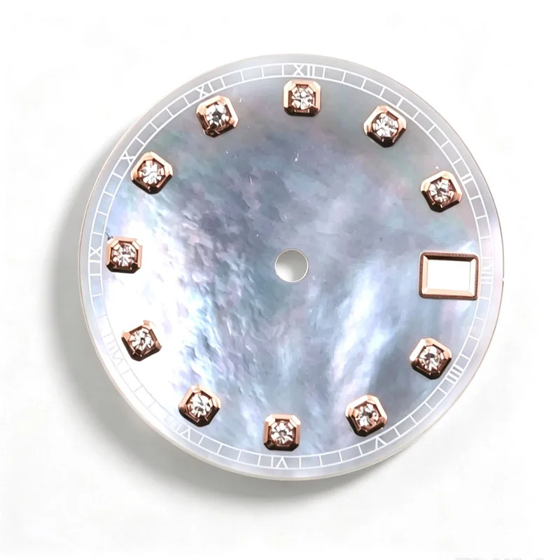 Custom Mother-of-Pearl dial is applied as a thin l
